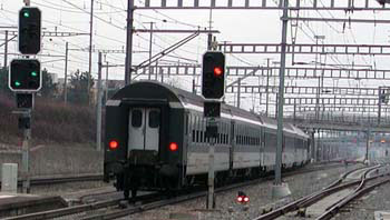 Eastbound train crossing over onto express track